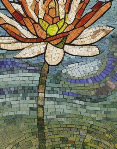 A close up of a flower in a mosaic