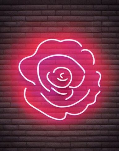 The flower neon sign on the brick wall