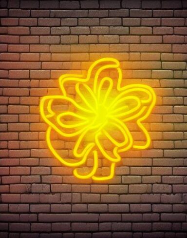 A yellow flower neon sign on a brick wall