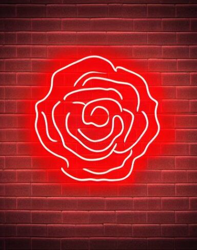 Red flower neon sign on a brick wall