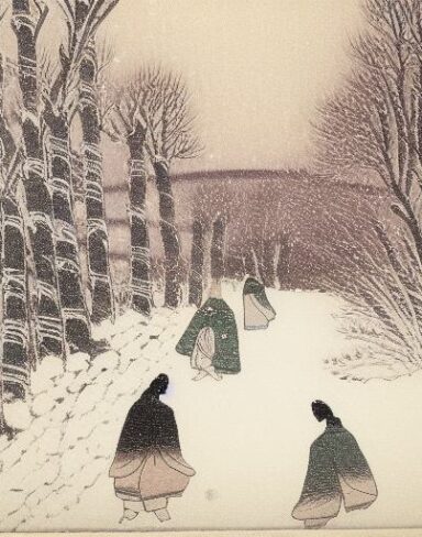 A couple of people walking down a snow covered street