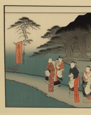 A group of people walking near a river