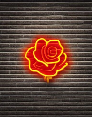 A orange flower neon sign on a brick wall