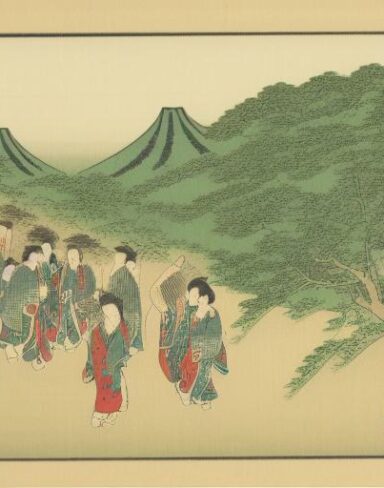 A people standing on top of a lush green hillside