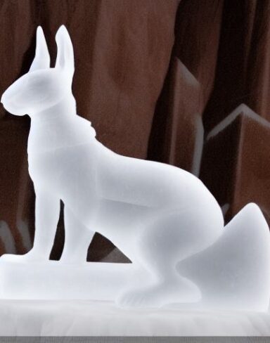 An ice sculpture of rabbit in the snow
