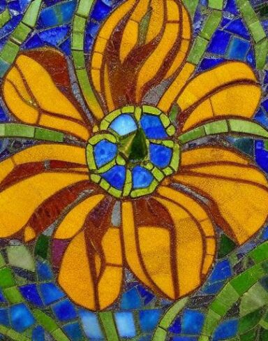 The close up of a flower on a mosaic