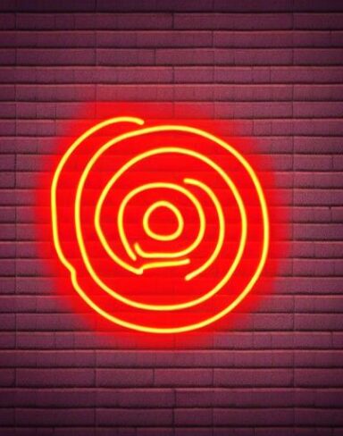 A small flower neon sign on a brick wall