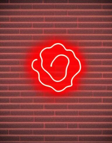 Simple flower neon sign on a brick wall