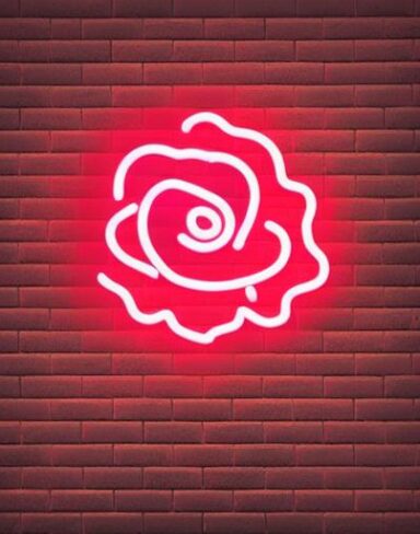 Flower neon sign on a brick wall