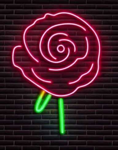 Flower neon sign on a brick wall