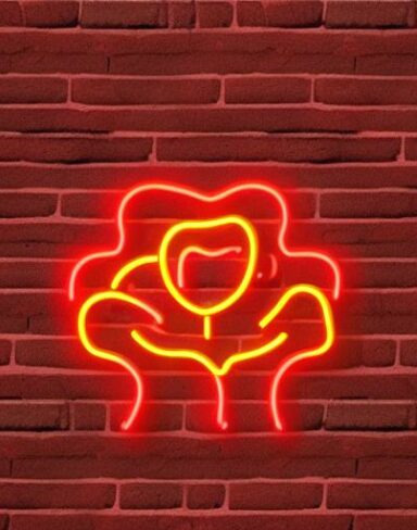 Flower neon sign on the brick wall