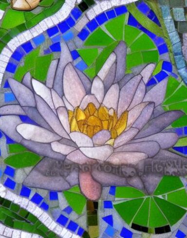 A close up of a flower in a mosaic