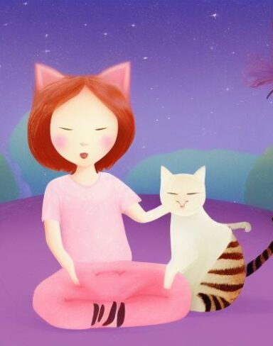 A girl sitting next to a cat