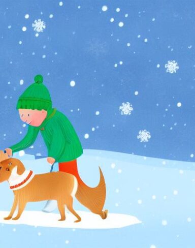 Boy with a dog in the snow