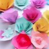 A bunch of paper flowers in many colors A bunch of paper flowers in many colors
