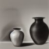 A black and white drawing of two vases and a bottle A black and white drawing of two vases and a bottle