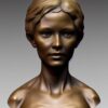 A bronze bust sculpture of one young lady A bronze bust sculpture of one young lady