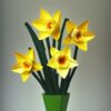 A paper daffodils contains inside a pot A paper daffodils contains inside a pot