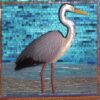 One bird that is standing in the water One bird that is standing in the water