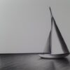 The pencil drawing of a sailboat in the water The pencil drawing of a sailboat in the water